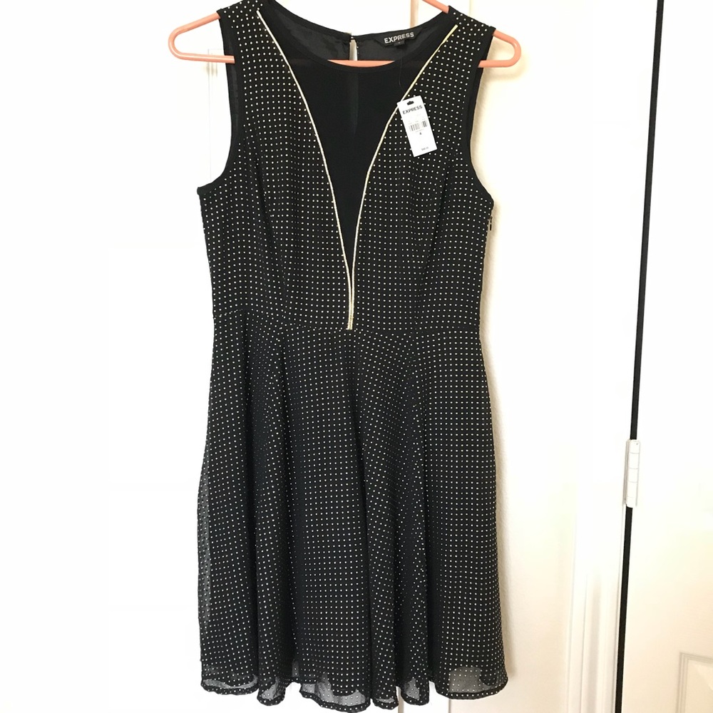 Brand new. Black and Gold flare out dress.
